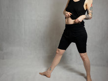 Load image into Gallery viewer, short yoga pants drop crotch pants made of organic cotton and bamboo superjersey shorts made to order made to your measurements black yoga shorts tattoo sleeve by noon tattoo
